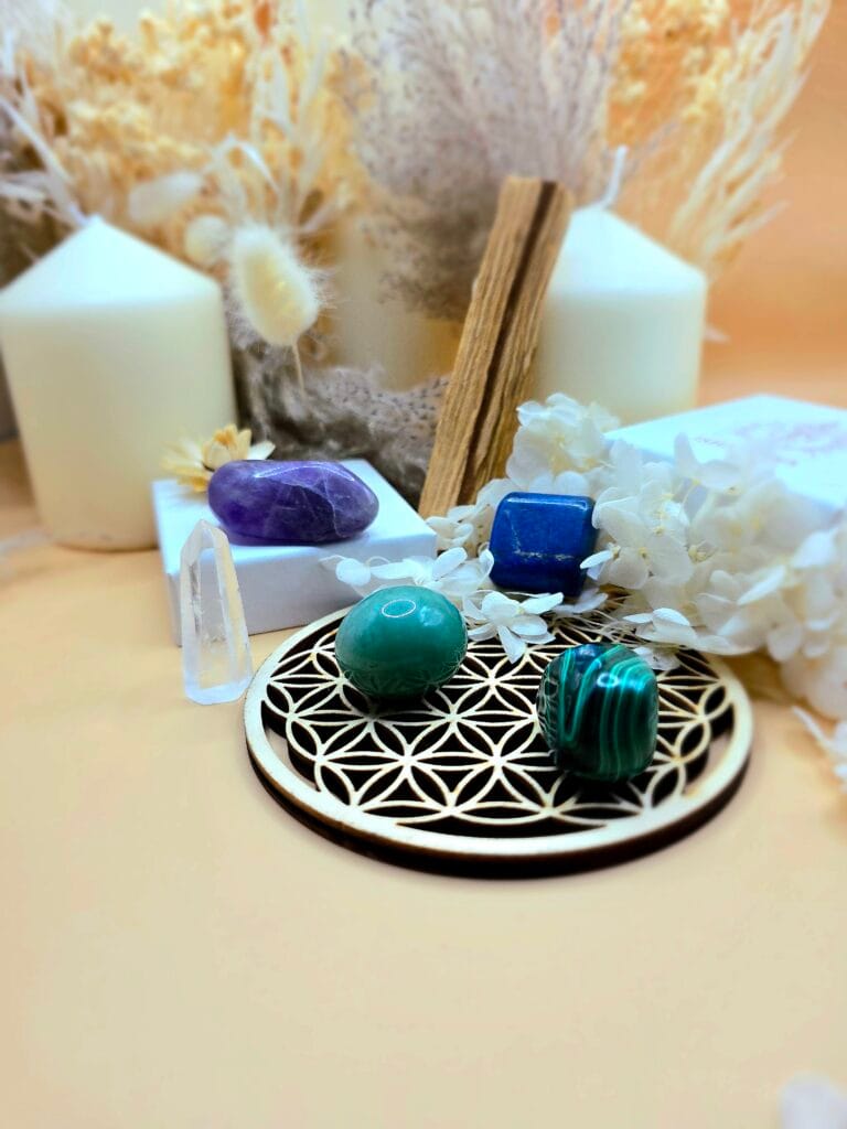 Coffret Soin Physique & Régénération avec pierres naturelles, palo santo et guide d’utilisation, favorisant le bien-être et la revitalisation.