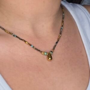 Collier Pendentif Goutte Turquoise d'Afrique – Élégance et protection naturelle