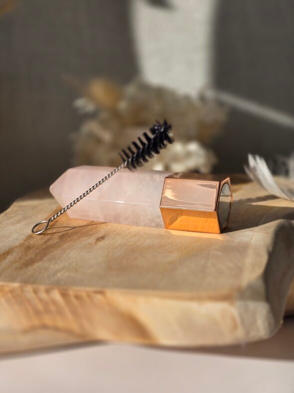 Roll-on massage 4 en 1 en quartz rose, lithothérapie et aromathérapie pour relaxation et apaisement.