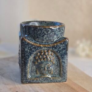 Brûleur Bouddha en céramique émaillée pour huiles essentielles et fondants de cire, créant une ambiance apaisante et méditative.