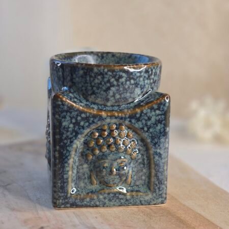 Brûleur Bouddha en céramique émaillée pour huiles essentielles et fondants de cire, créant une ambiance apaisante et méditative.